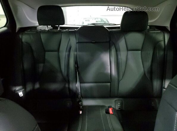 LRBFZME40RD065065 2024 BUICK ENVISION Black Vista de los asientos traseros