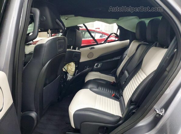 SALRT2RX8M2448306 2021 LAND ROVER DISCOVERY Silver Vista interior trasera