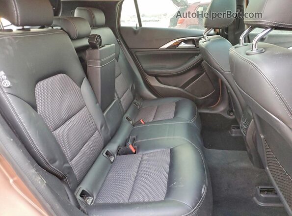 SJKCH5CP6KA007301 2019 INFINITI QX30 Pink Widok wnętrza z tyłu
