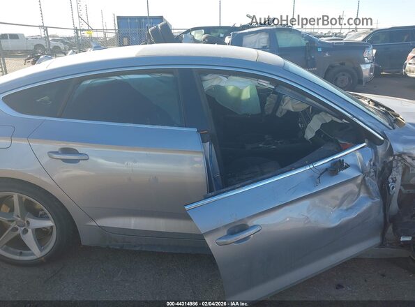 WAUENCF57KA098708 2019 AUDI OTHER Серебряный Вид задней части салона