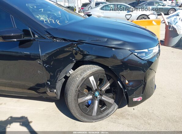 WB523CF00SCS07882 2025 BMW IX Черный Вид спереди