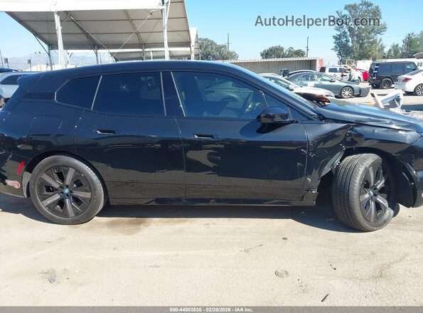 WB523CF00SCS07882 2025 BMW IX Черный Вид задней части салона