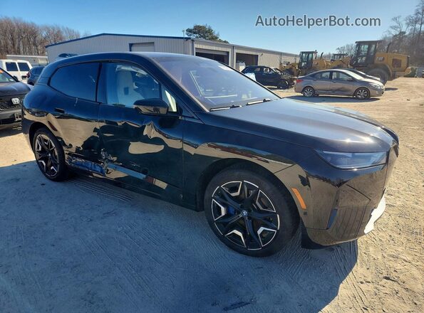 WB523CF00SCS31390 2025 BMW IX Черный Передняя правая четверть