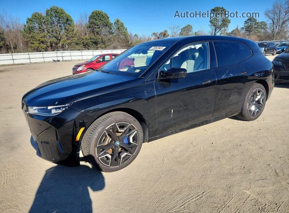 WB523CF00SCS31390 2025 BMW IX Черный Передняя левая четверть