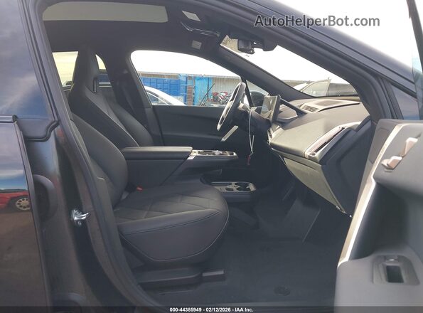 WB523CF01SCS53446 2025 BMW IX Black Вид салону спереду