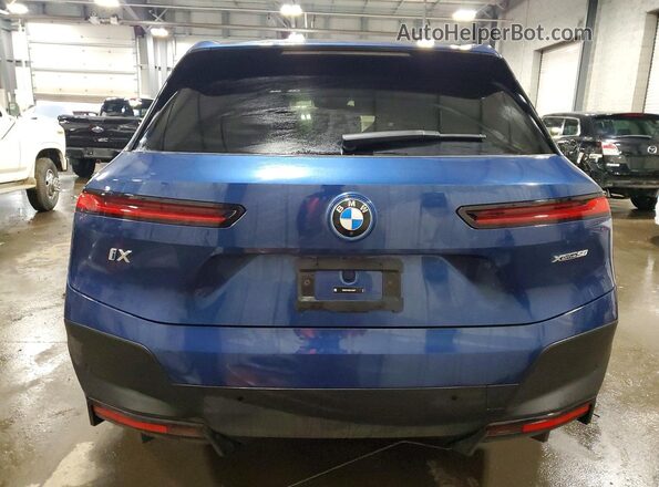 WB523CF06SCT45877 2025 BMW IX Blue უკანა ხედი