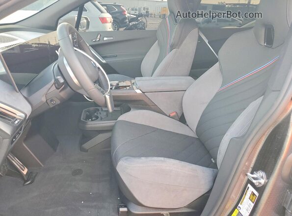 WB543CF04TCW04831 2026 BMW IX Белый Вид салона спереди