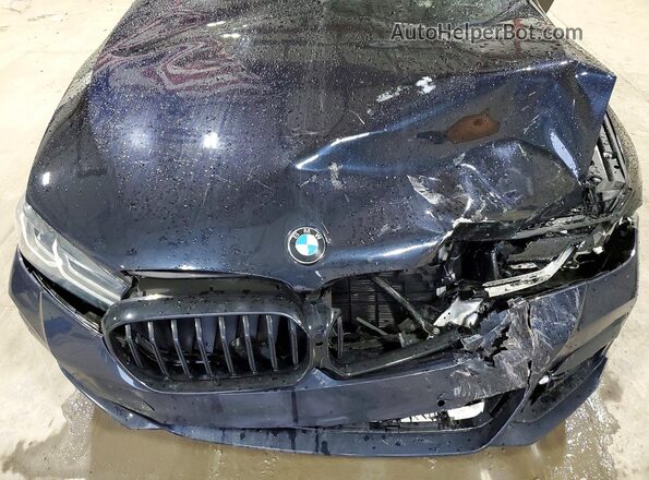 WBA13BK08MCF58137 2021 BMW M5 Синий Вид задней части салона