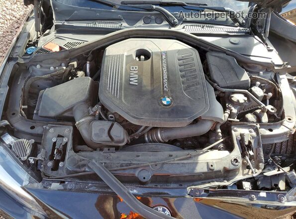 WBA2J5C57JVC07161 2018 BMW M2 Black Vista interior trasera