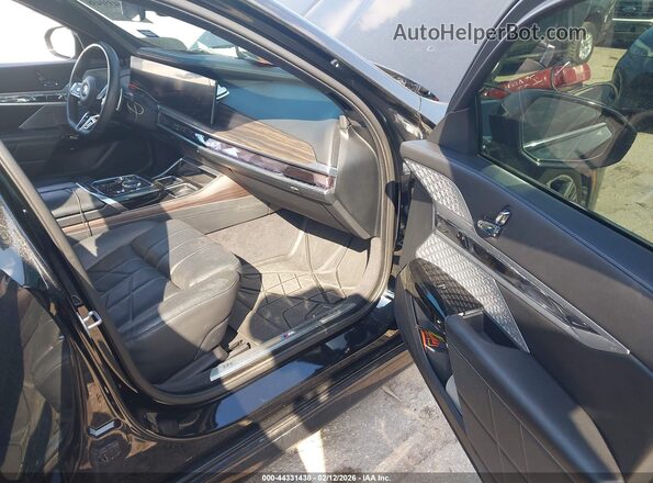 WBA33EJ05PCM90618 2023 BMW OTHER Black Front interior view