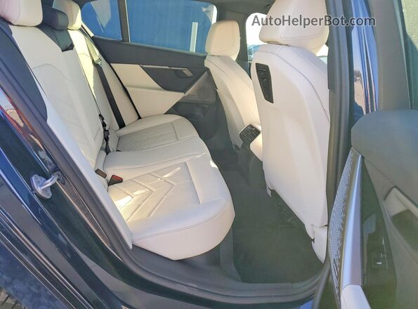 WBA43FJ04TCV26433 2026 BMW OTHER Blue Vista de los asientos traseros