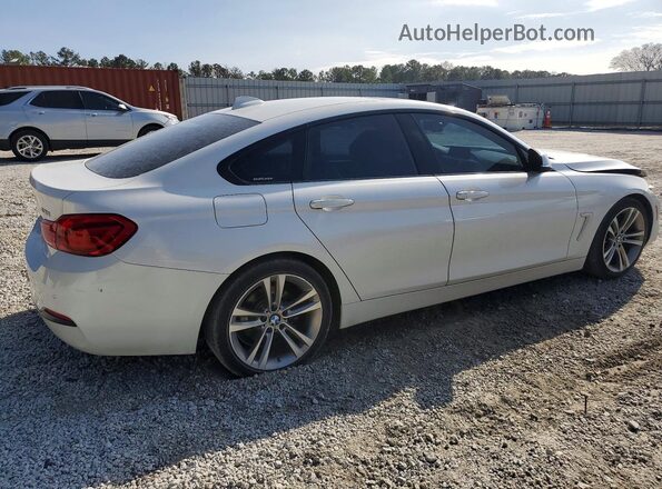 WBA4J1C52KBM15420 2019 BMW OTHER White Front right