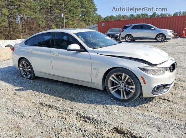 WBA4J1C52KBM15420 2019 BMW OTHER White Front view