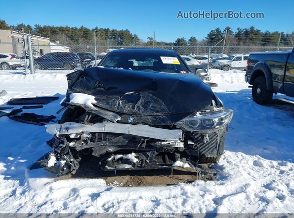WBA4J3C56KBL08222 2019 BMW OTHER Черный Вид задней части салона