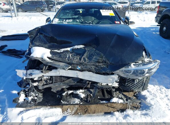 WBA4J3C56KBL08222 2019 BMW OTHER Черный Вид спереди