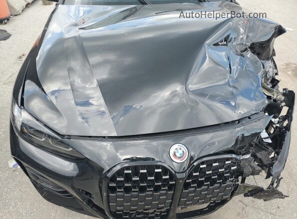 WBA63AT06PCL45459 2023 BMW M4 Black Widok wnętrza z tyłu