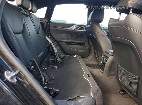 WBA63AV02NFM09232 2022 BMW OTHER Black Widok tylnych siedzeń