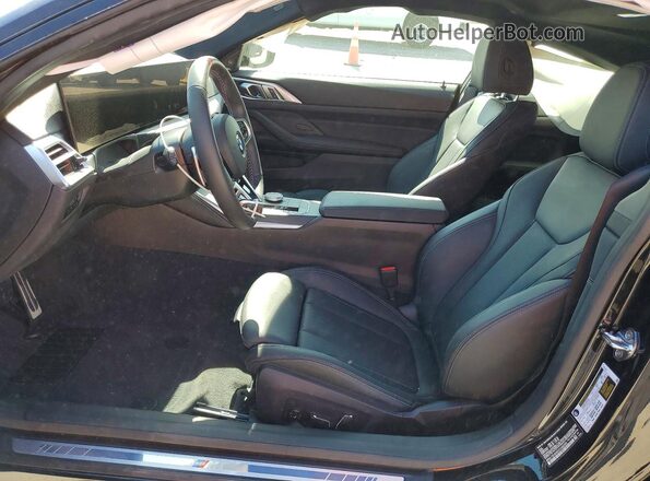 WBA73DA0XSCU66299 2025 BMW M4 Black Vista interior delantera