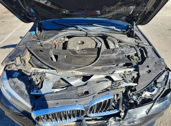 WBA7E2C58KB218548 2019 BMW OTHER Black Widok wnętrza z tyłu
