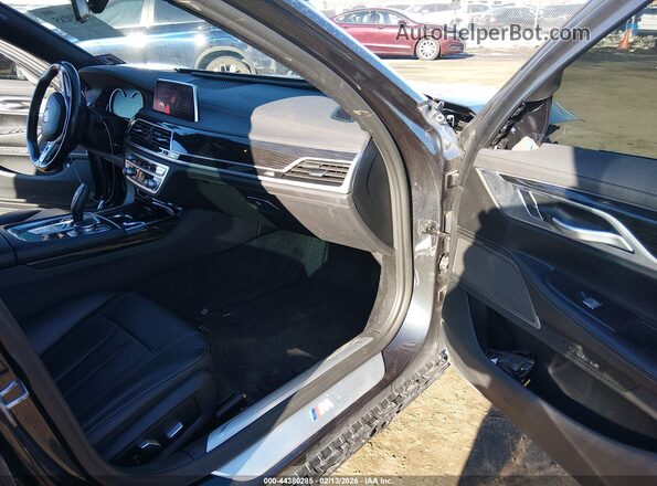 WBA7E4C55KGV70582 2019 BMW OTHER Черный Вид салона спереди