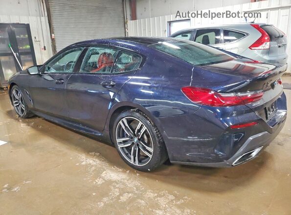 WBAGV8C00PCL61874 2023 BMW M8 Black Tył lewy