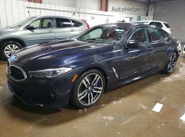 WBAGV8C00PCL61874 2023 BMW M8 Black Przód lewy