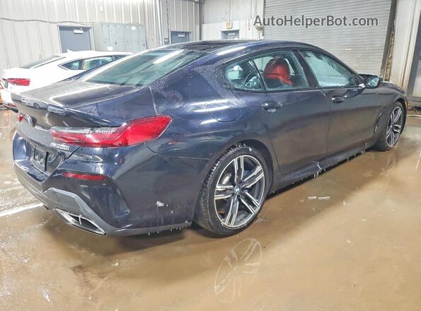 WBAGV8C00PCL61874 2023 BMW M8 Black Tył prawy