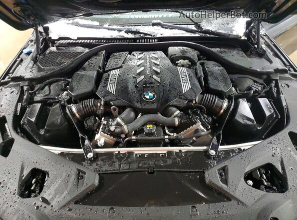 WBAGV8C00PCL61874 2023 BMW M8 Black Widok wnętrza z tyłu