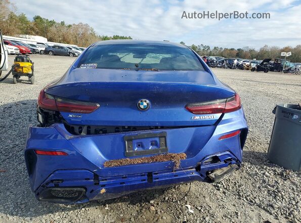 WBAGV8C02PCL67191 2023 BMW M8 Blue Widok z tyłu