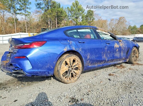 WBAGV8C02PCL67191 2023 BMW M8 Blue Tył prawy