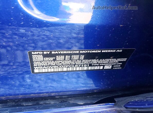 WBAGV8C02PCL67191 2023 BMW M8 Blue Widok komory silnika
