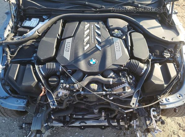 WBAGV8C05NCJ84106 2022 BMW M8 Серый Вид задней части салона