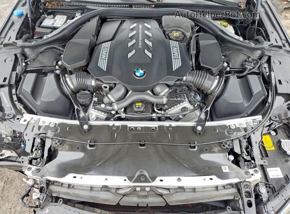 WBAGV8C0XPCK82373 2023 BMW M8 Черный Вид задней части салона