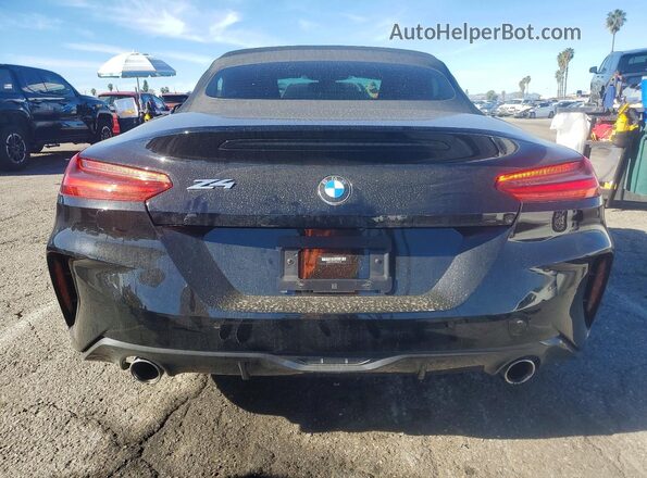 WBAHF3C07MWX34732 2021 BMW Z4 Black Vista trasera