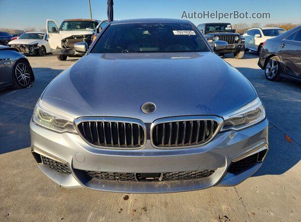 WBAJB9C53JG463671 2018 BMW M5 Gray Rear view