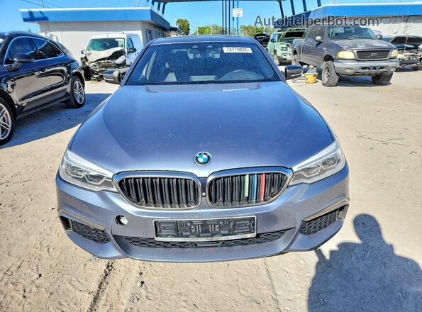WBAJB9C59JB035844 2018 BMW M5 Gray Вид спереду