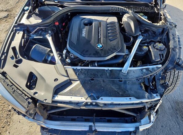 WBAJE7C59KWW42140 2019 BMW OTHER Black Widok wnętrza z tyłu