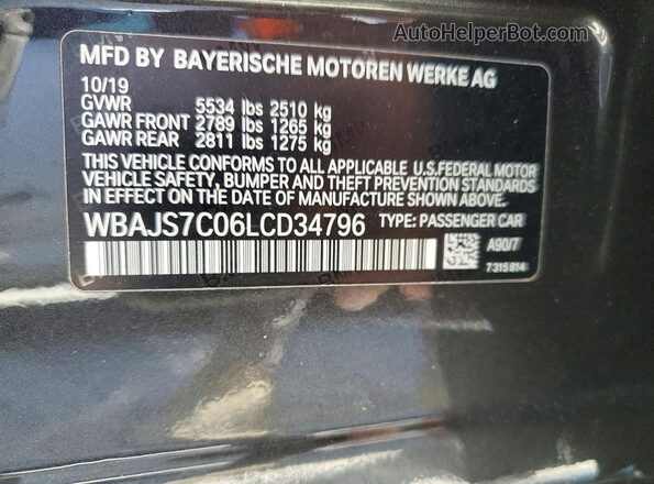 WBAJS7C06LCD34796 2020 BMW M5 Charcoal Engine compartment view