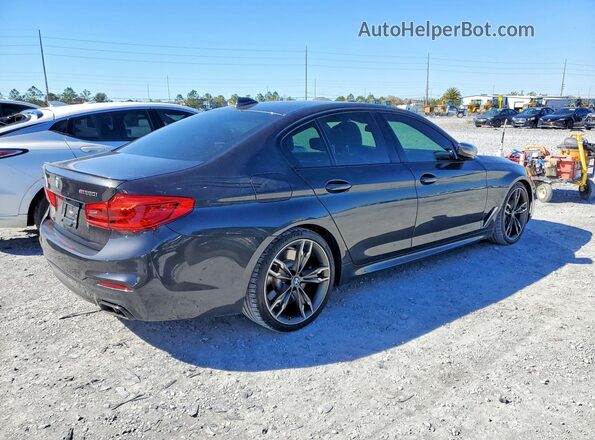 WBAJS7C06LCD34796 2020 BMW M5 Charcoal Rear right
