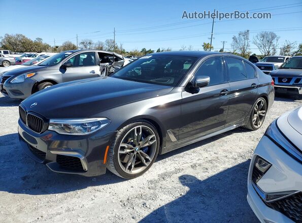 WBAJS7C06LCD34796 2020 BMW M5 Charcoal Front left