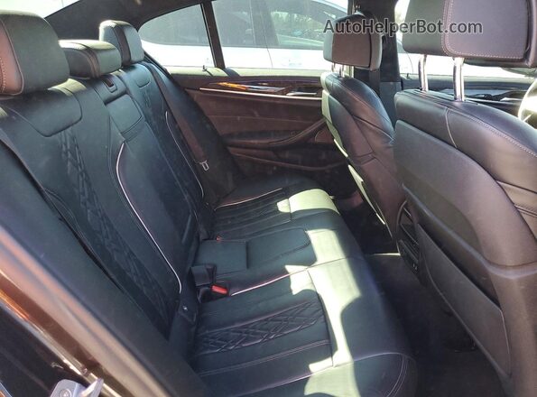 WBAJS7C06LCD34796 2020 BMW M5 Charcoal Rear seats view