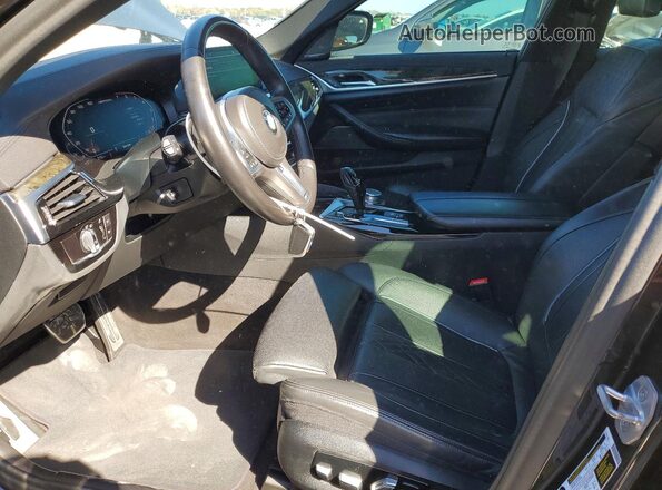 WBAJS7C06LCD34796 2020 BMW M5 Charcoal Front interior view