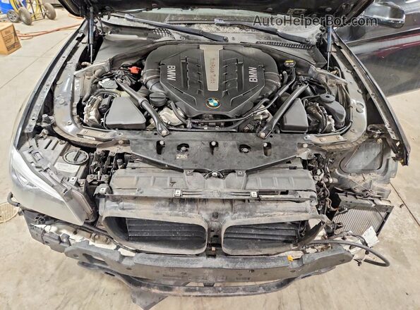 WBAKP9C55GD980289 2016 BMW 5 SERIES Черный Вид задней части салона