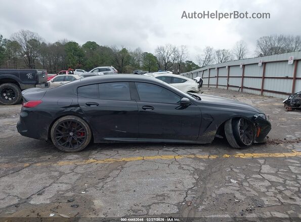 WBSGV0C06PCL37737 2023 BMW M8 Black Widok wnętrza z tyłu