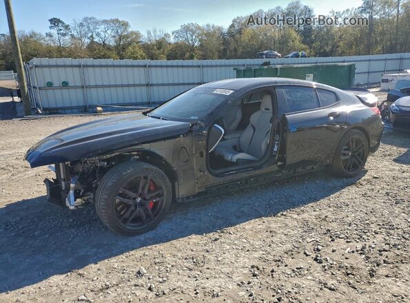 WBSGV0C09RCR90503 2024 BMW M8 Черный Передняя левая четверть