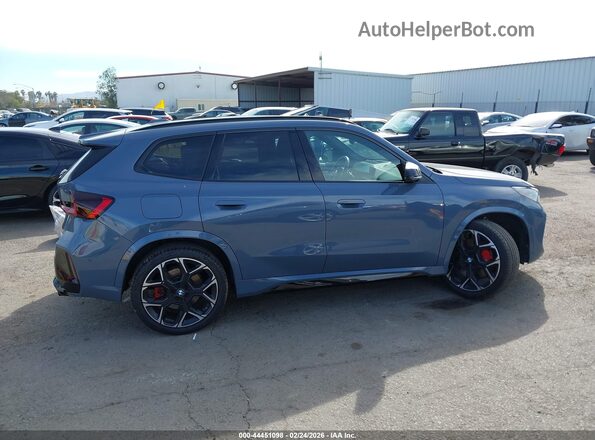 WBX13EF07R5023486 2024 BMW X1 Серый Вид задней части салона
