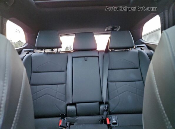 WBX73EF06P5X90771 2023 BMW X1 Silver Rear seats view