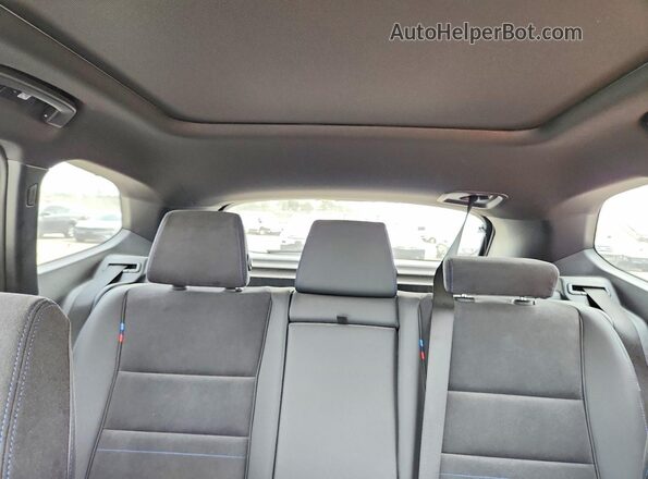 WBX73EF09T5462237 2026 BMW X1 Blue Vista de los asientos traseros