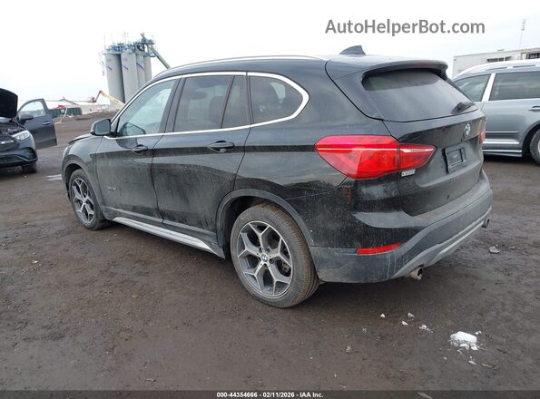 WBXHT3C30GP883734 2016 BMW X1 Black Trasero izquierdo