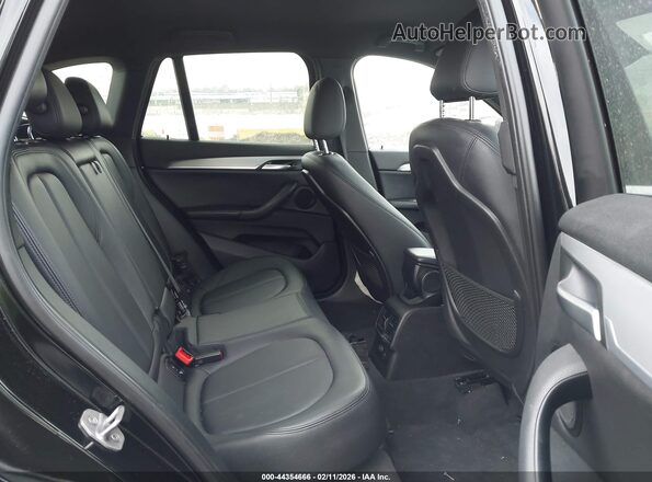 WBXHT3C30GP883734 2016 BMW X1 Black Vista de la etiqueta del VIN